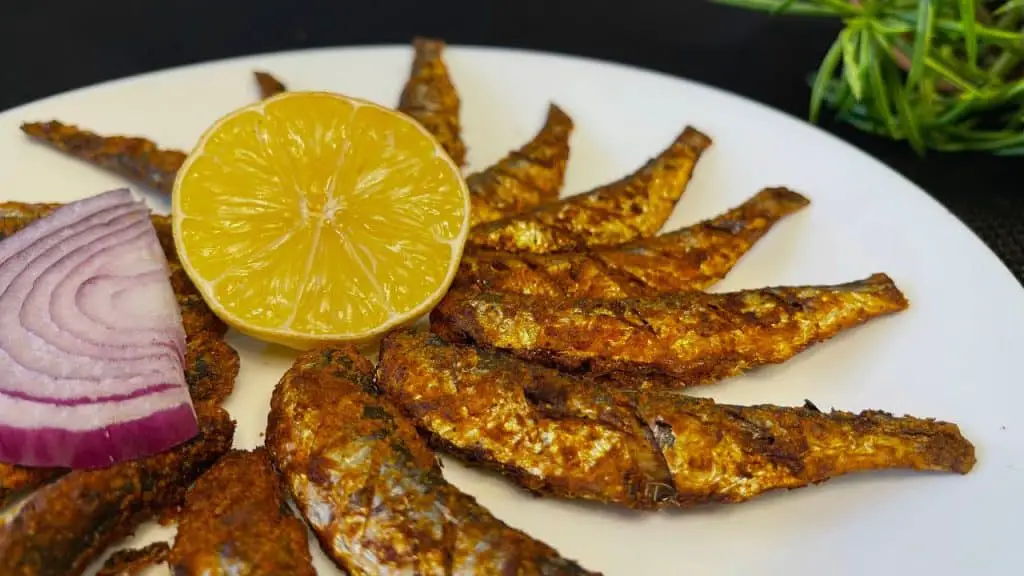 A air fryer é a solução para preparar sardinhas crocantes e deliciosas em poucos minutos. Experimente essa receita irresistível!